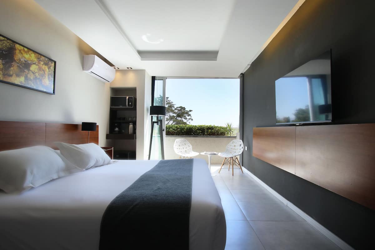 Suite Garden | 1 slaapkamer, luxe beddengoed, een minibar, een kluis op de kamer