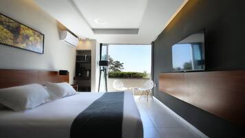 Suite Garden | Ropa de cama de alta calidad, minibar, caja fuerte