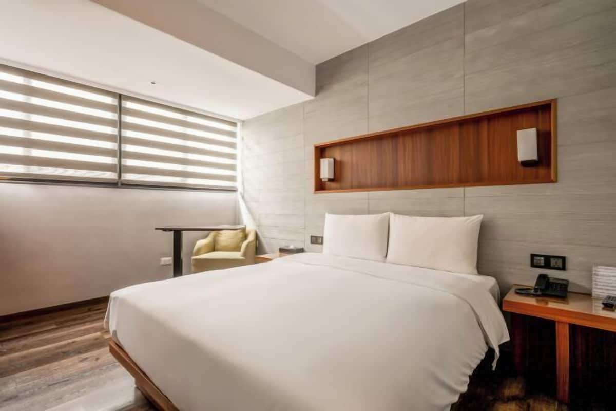 Premium-sengetøj, dundyner, minibar, individuelt design