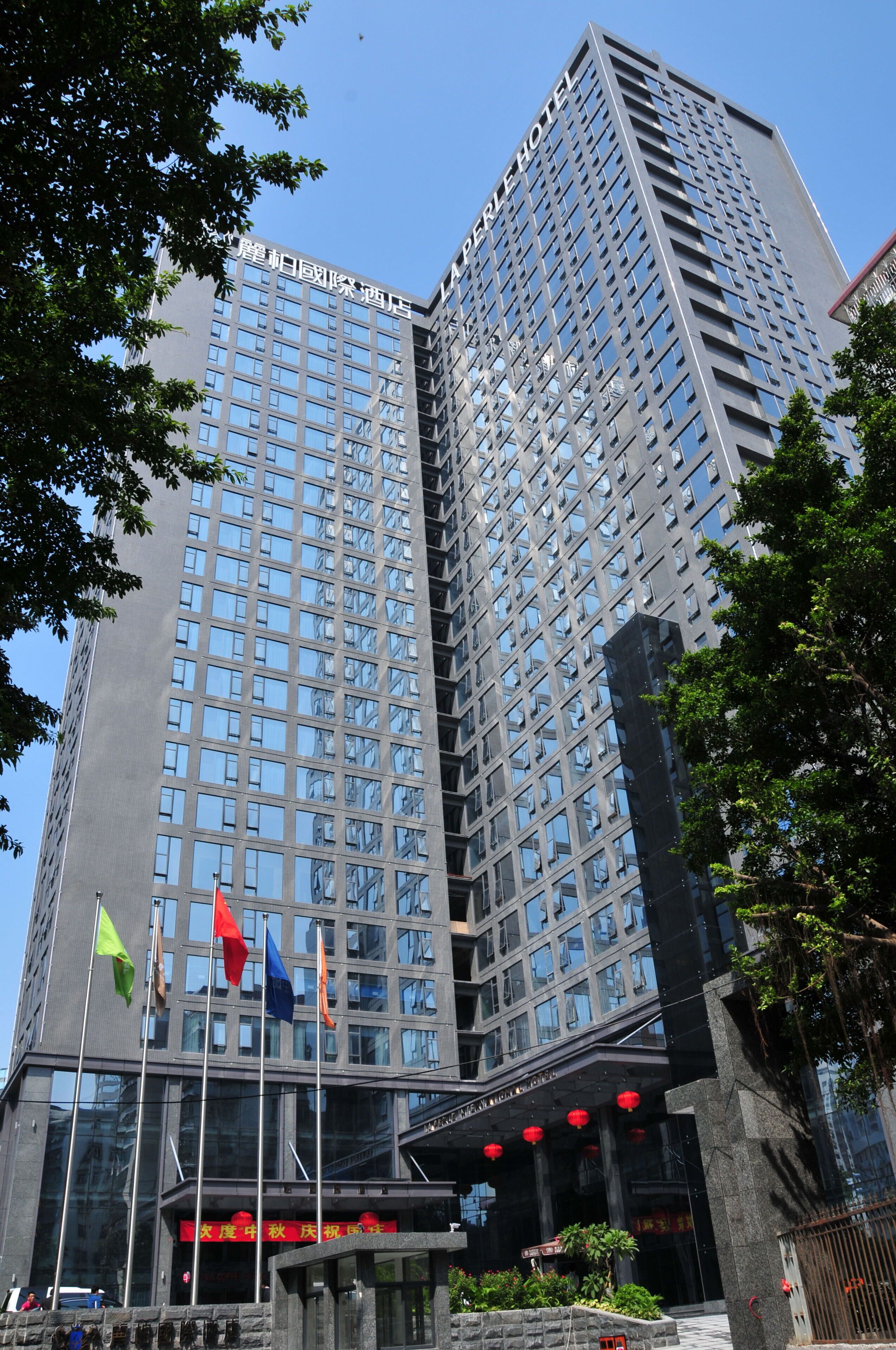 Foto - La Perle International Hotel