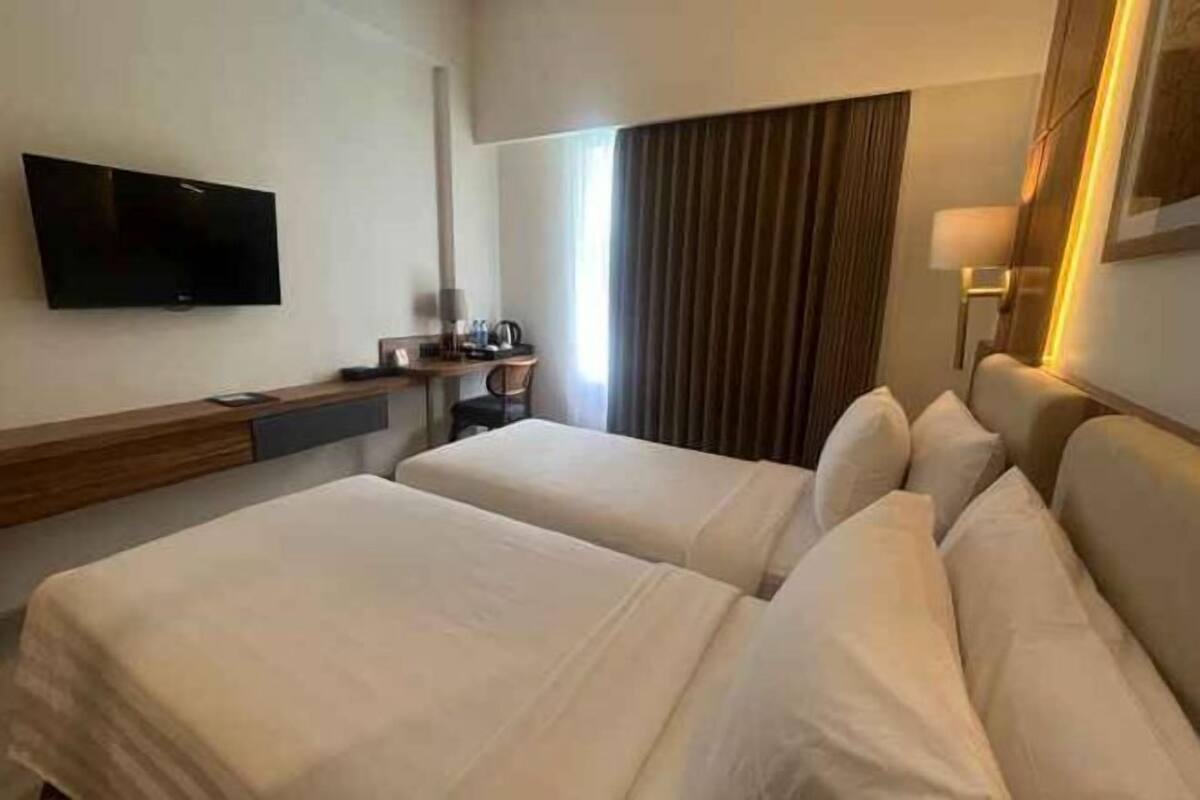 Free minibar items, in-room safe, desk, laptop workspace