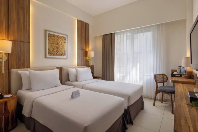 Free minibar items, in-room safe, desk, laptop workspace