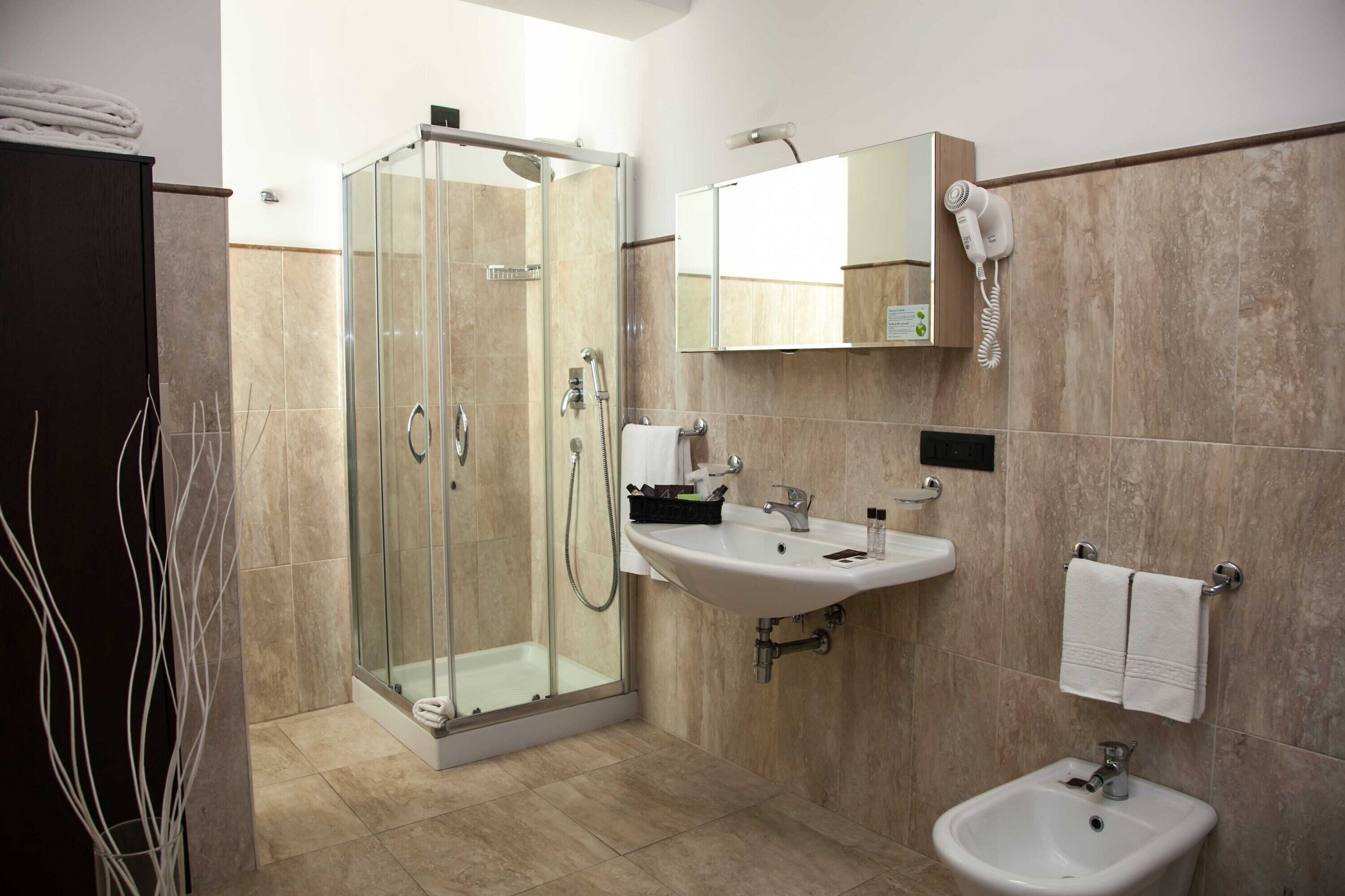 hair dryer, bidet, towels