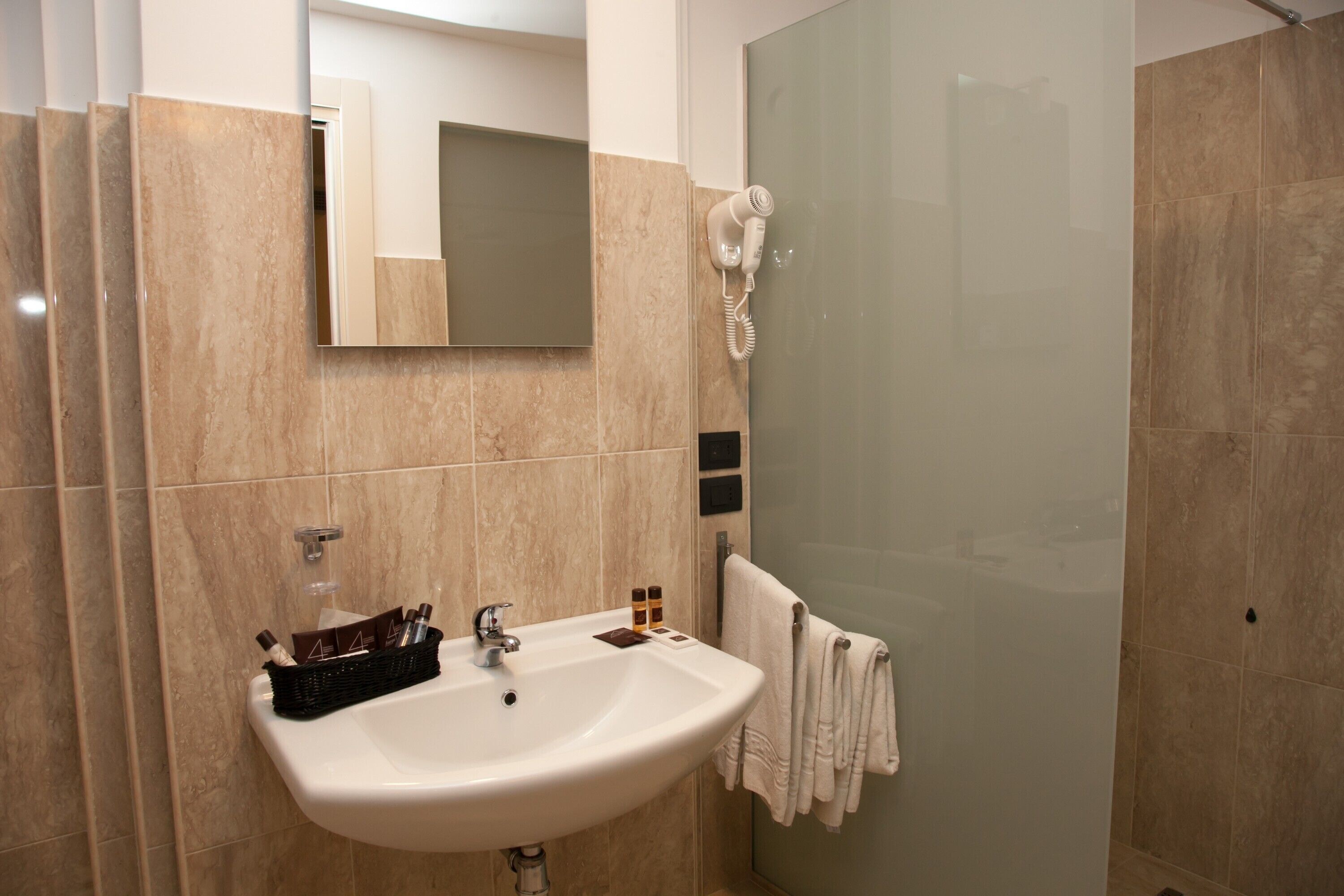 hair dryer, bidet, towels