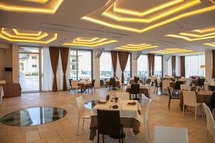 Lunch, dinner served; Italian cuisine, pool views 