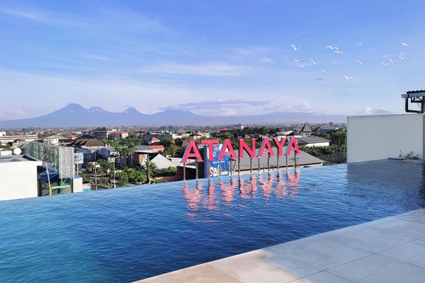 Outdoor pool, open 7:00 AM to 9:00 PM, pool umbrellas, sun loungers