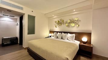 Suíte júnior | 1 quarto, roupas de cama premium, frigobar, cofres nos quartos