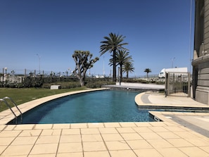 Indoor pool, seasonal outdoor pool, pool umbrellas, pool loungers