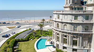 Indoor pool, seasonal outdoor pool, pool umbrellas, sun loungers