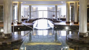 Indoor pool, seasonal outdoor pool, pool umbrellas, pool loungers