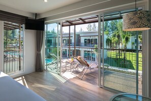 Upper Pool Access | Minibar, in-room safe, desk, blackout curtains