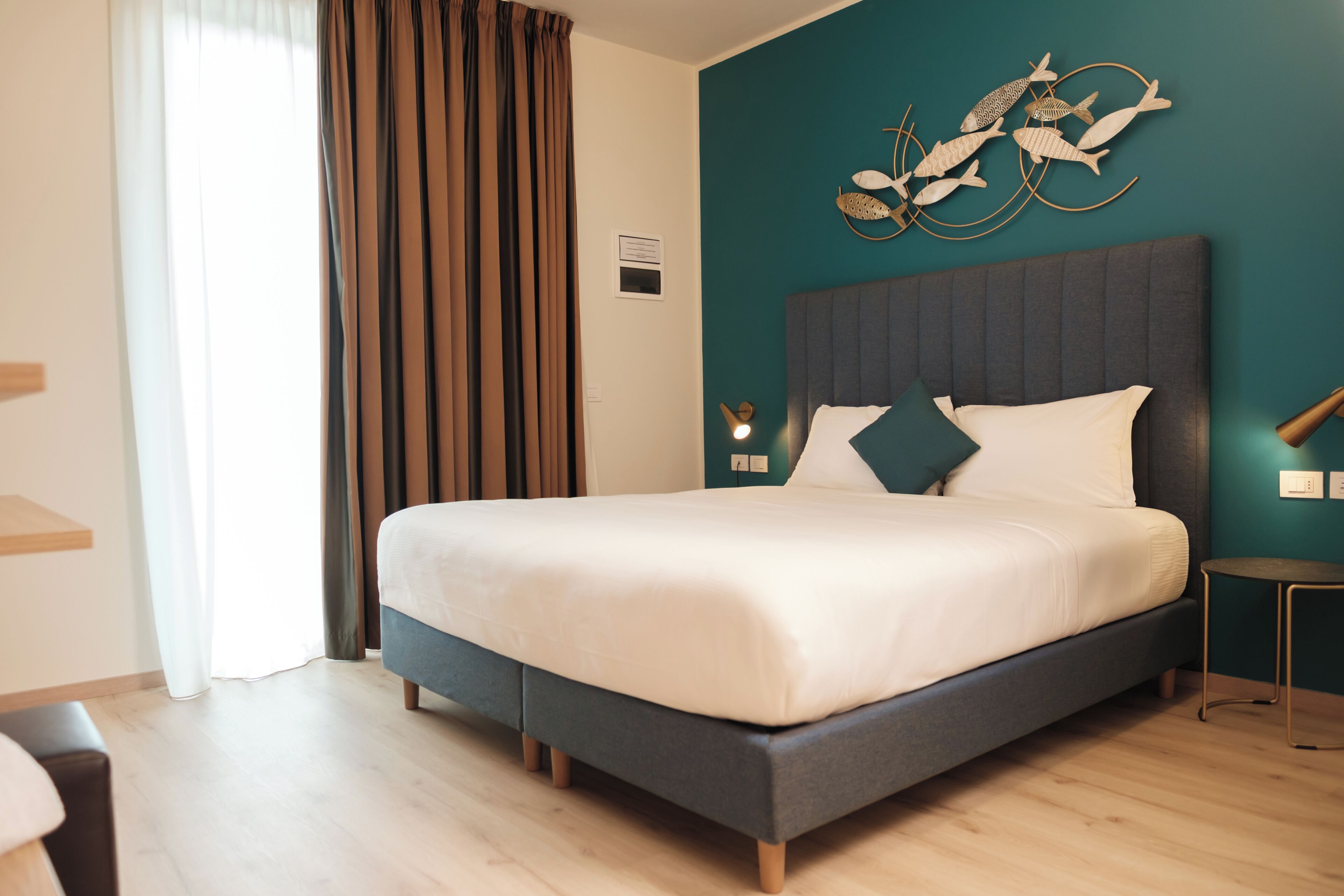 Superior Room with terrace and lake view | Minibar, in-room safe, individually decorated, desk