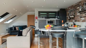 Penthouse, 2 Bedrooms (Sleeps 6, with Sofa Bed) | Living area | LCD TV