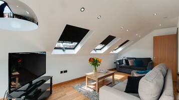 Penthouse, 2 Bedrooms (Sleeps 6, with Sofa Bed) | Living room | LCD TV