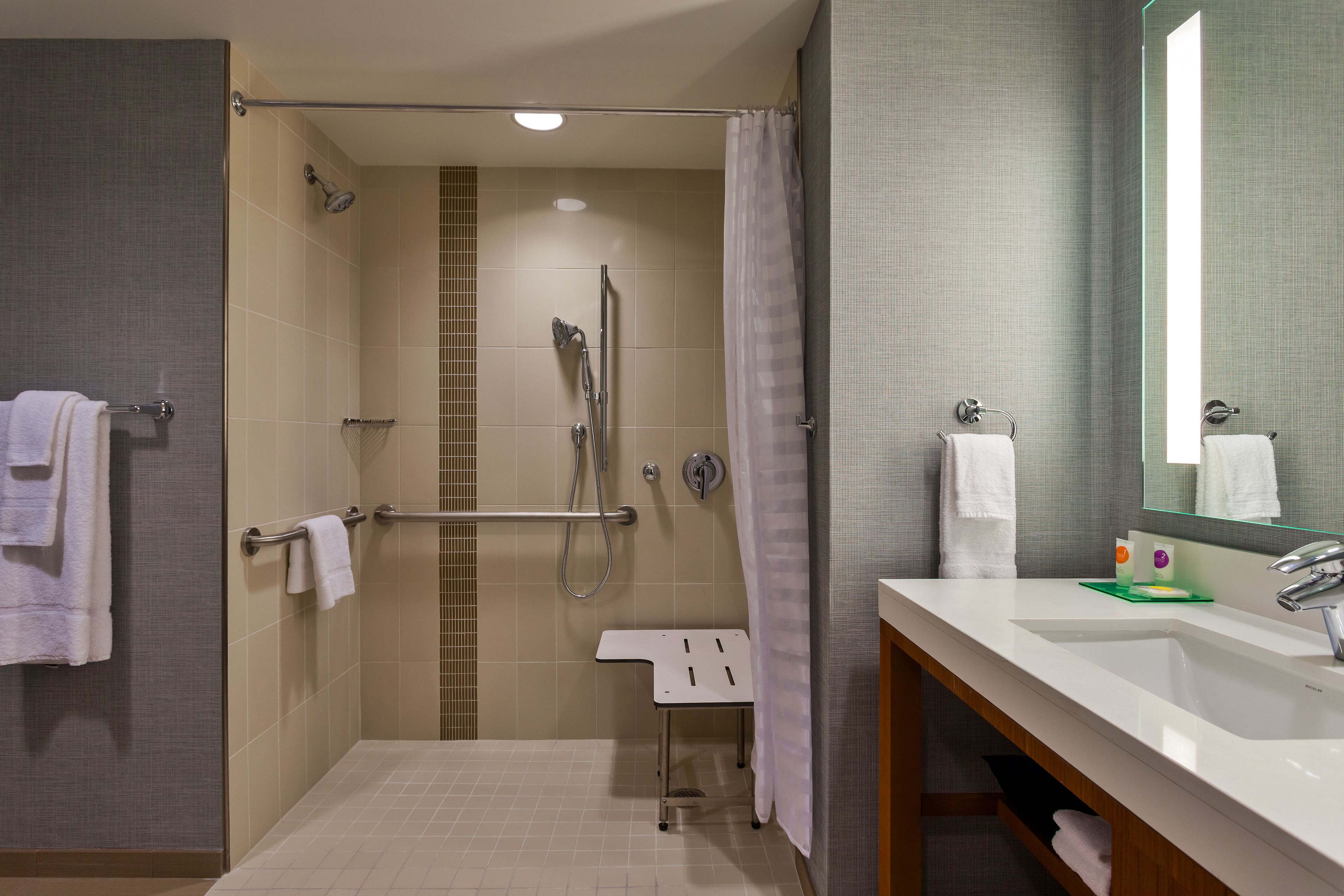 room, 1 king bed, accessible (shower) | bathroom | designer toiletries, hair dryer, towels