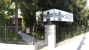 A hotel sign with the name 'Komilfo Hotel' and contact information. - Komilfo Hotel (Chisinau)
