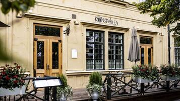 Breakfast, lunch served; international cuisine, al fresco dining