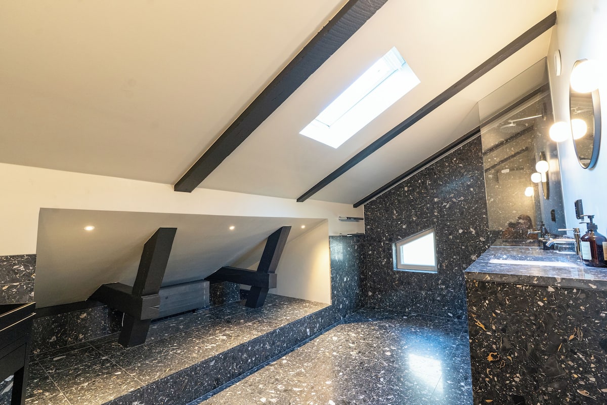 Designer toiletries, hair dryer, heated floors, towels