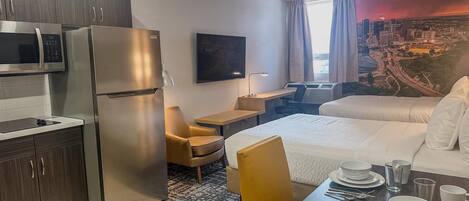 Pillowtop beds, desk, iron/ironing board, travel crib