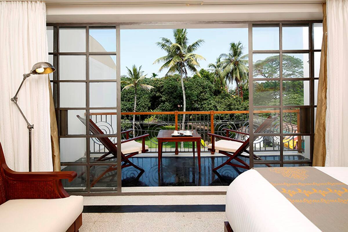 Garden room with Private terrace | Minibar, caja fuerte, escritorio y sistema de insonorización