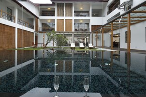 Outdoor pool, sun loungers, lifeguards on site