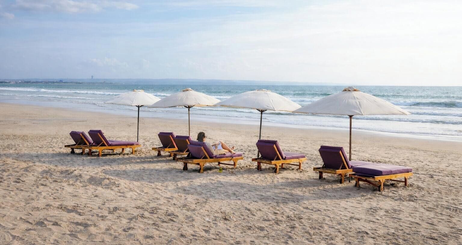 Beach nearby, white sand, beach towels