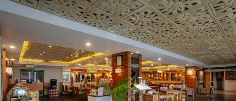 Breakfast, lunch served; international cuisine, pool views