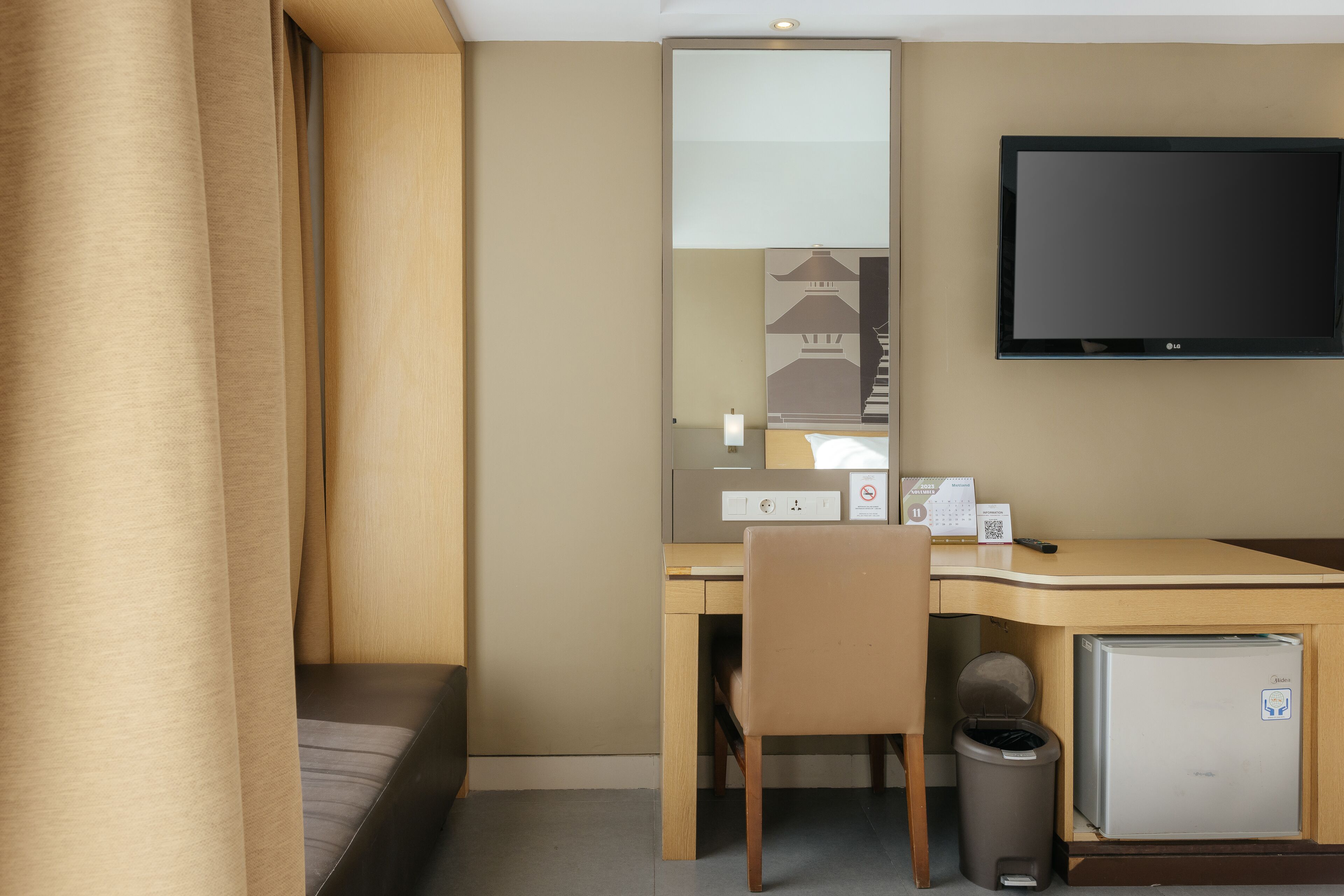 deluxe room pool view with free balinese culture experience | premium bedding, minibar, in-room safe, desk