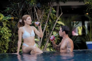 Outdoor pool, pool umbrellas, pool loungers