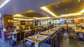 Breakfast, lunch served; international cuisine, pool views