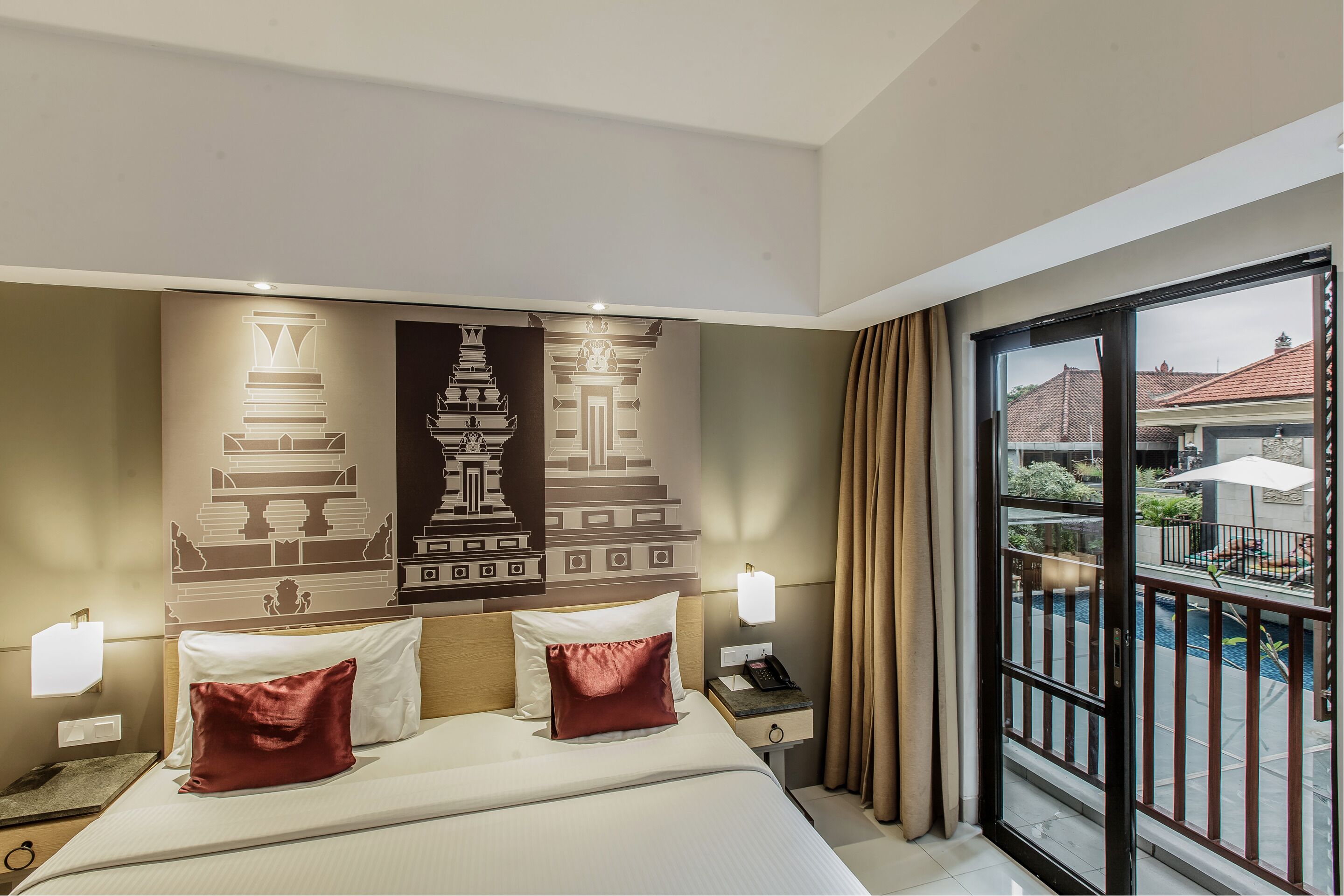 deluxe room pool view with free balinese culture experience | premium bedding, minibar, in-room safe, desk