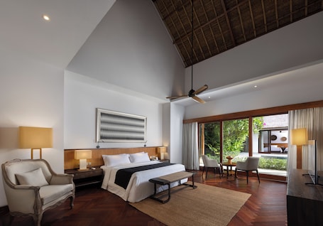 Minibar, in-room safe, desk, laptop workspace. Impiana Private Villas Seminyak