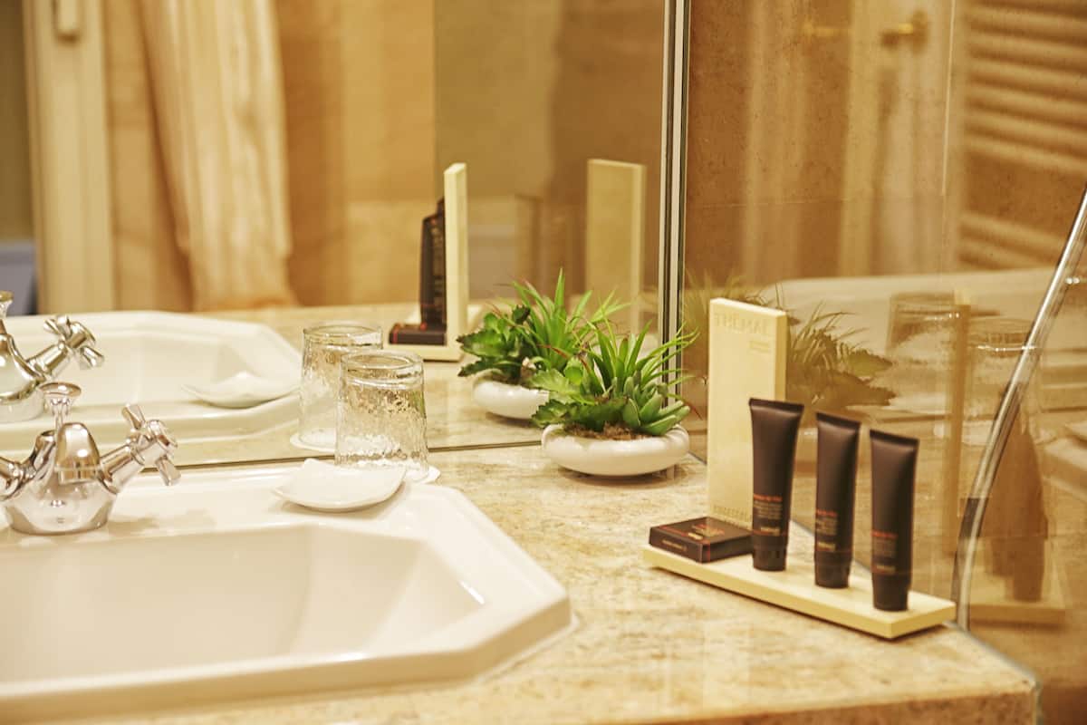 suite, 1 queen bed, non smoking (ming) | bathroom amenities | designer toiletries, hair dryer, bathrobes, slippers