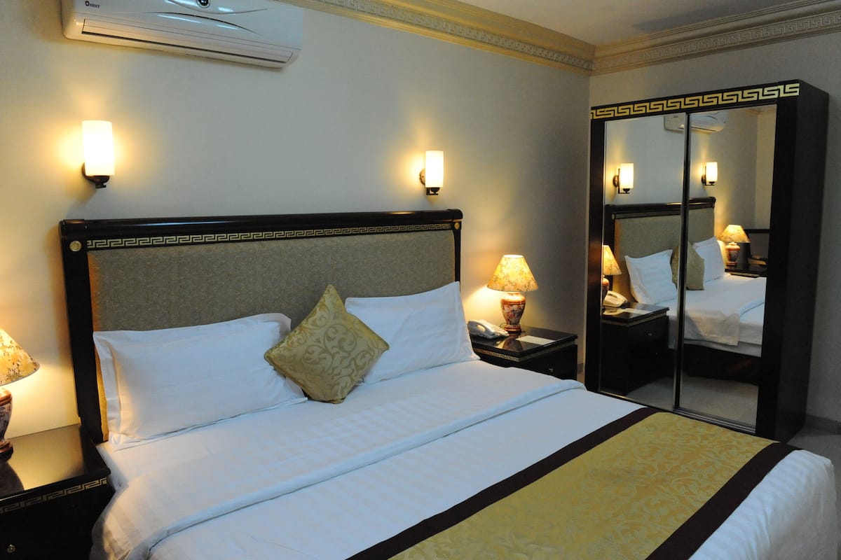 Hypo-allergenic bedding, down duvets, minibar, in-room safe