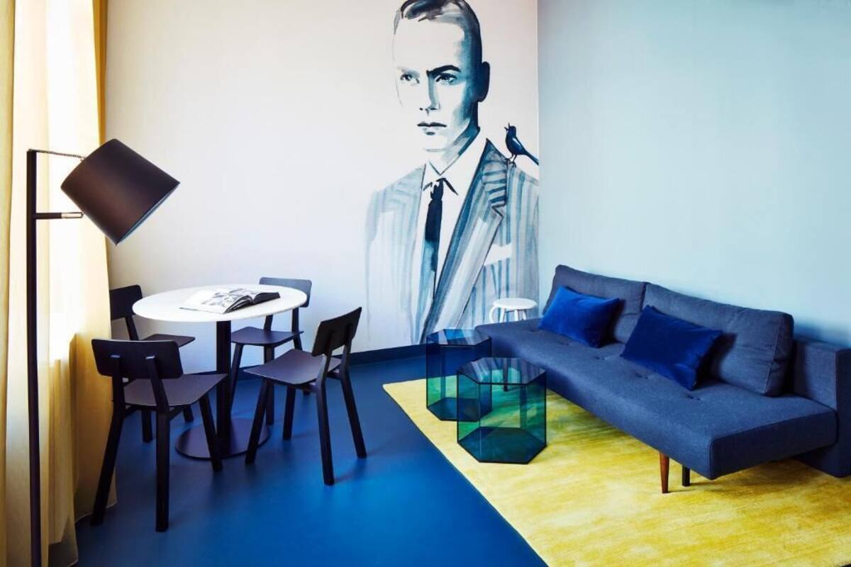 Apartamento de diseño, 1 habitación | Zona de estar | Una Smart TV