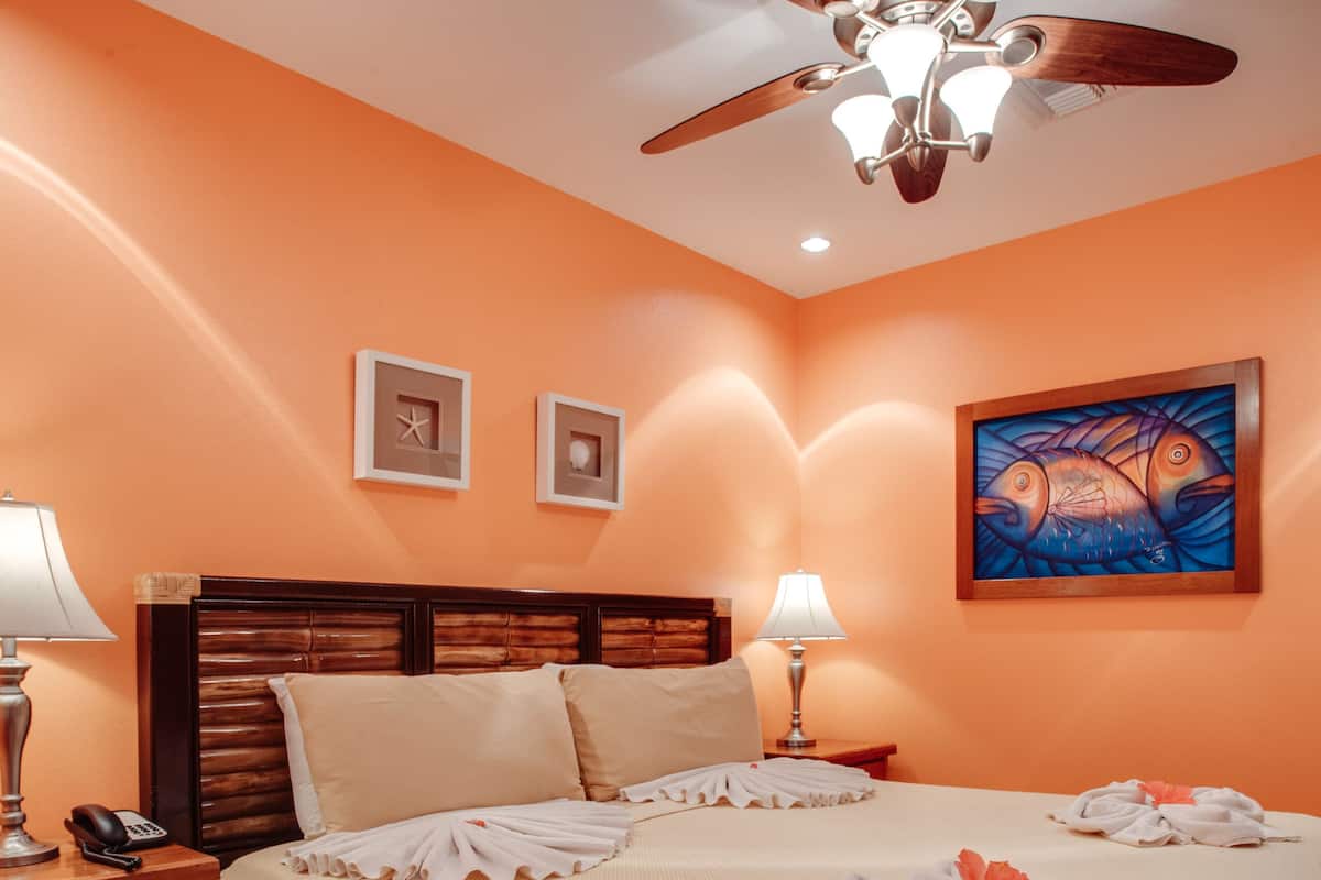 Condo, 1 Bedroom, Sea View | 1 bedroom, memory-foam beds, in-room safe, individually decorated