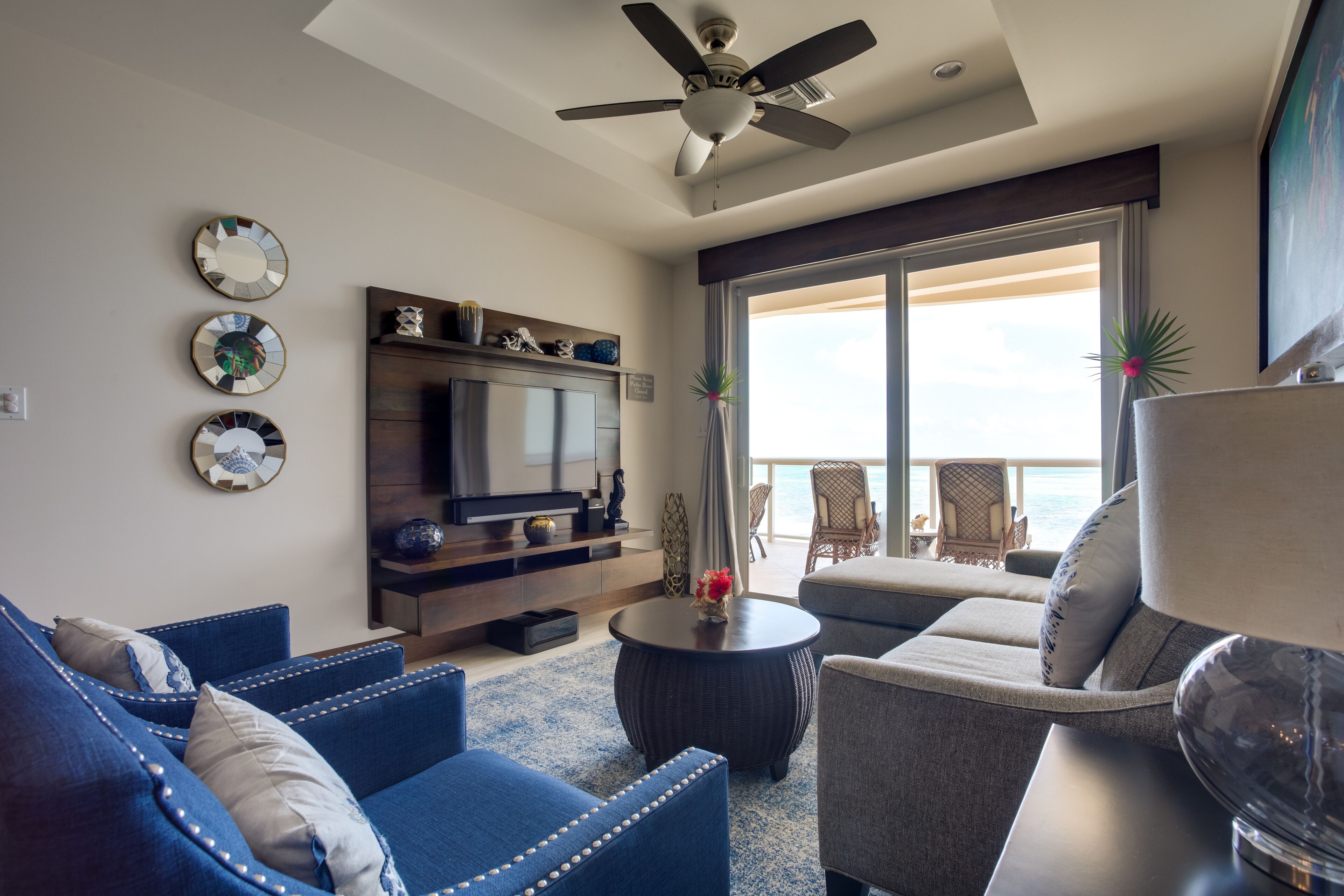deluxe condo, 1 bedroom, beach view | living area | 32-inch flat-screen tv with cable channels, tv