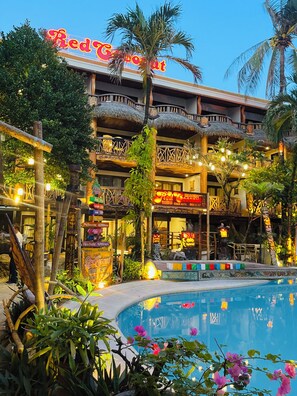 Outdoor pool, open 10:00 AM to 5:00 PM, pool loungers - Red Coconut Beach Hotel (Boracay Island)