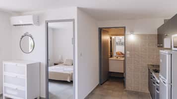 Appartement de 2 Ă 4 personnes | 1 chambre, coffres-forts dans les chambres, rideaux occultants