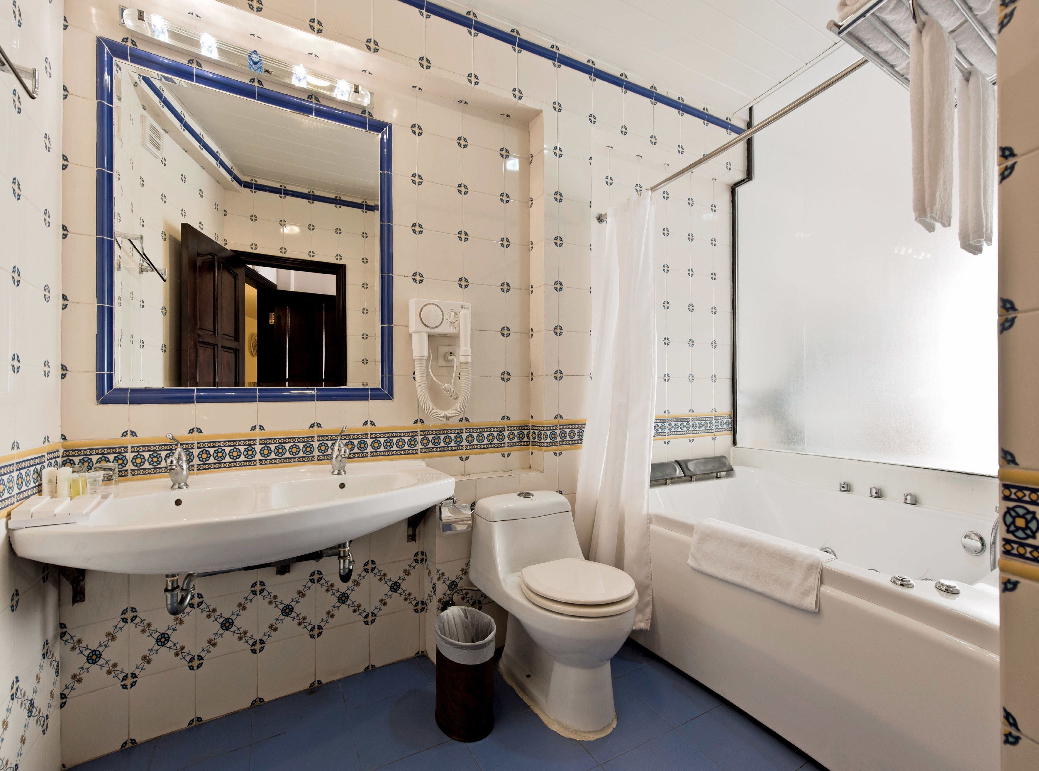 combined shower/bathtub, free toiletries, hair dryer, bathrobes