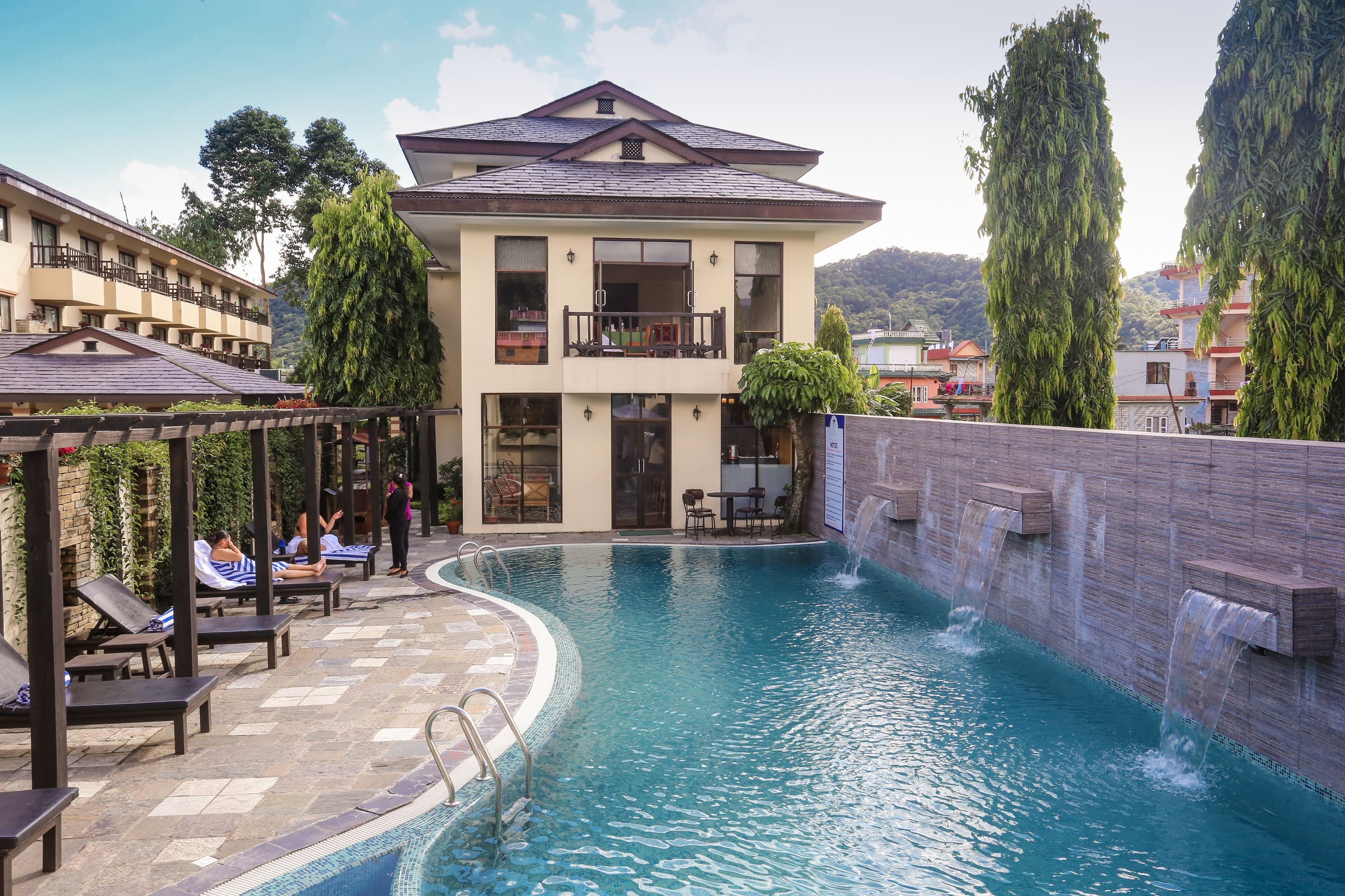 indoor pool, outdoor pool, pool loungers