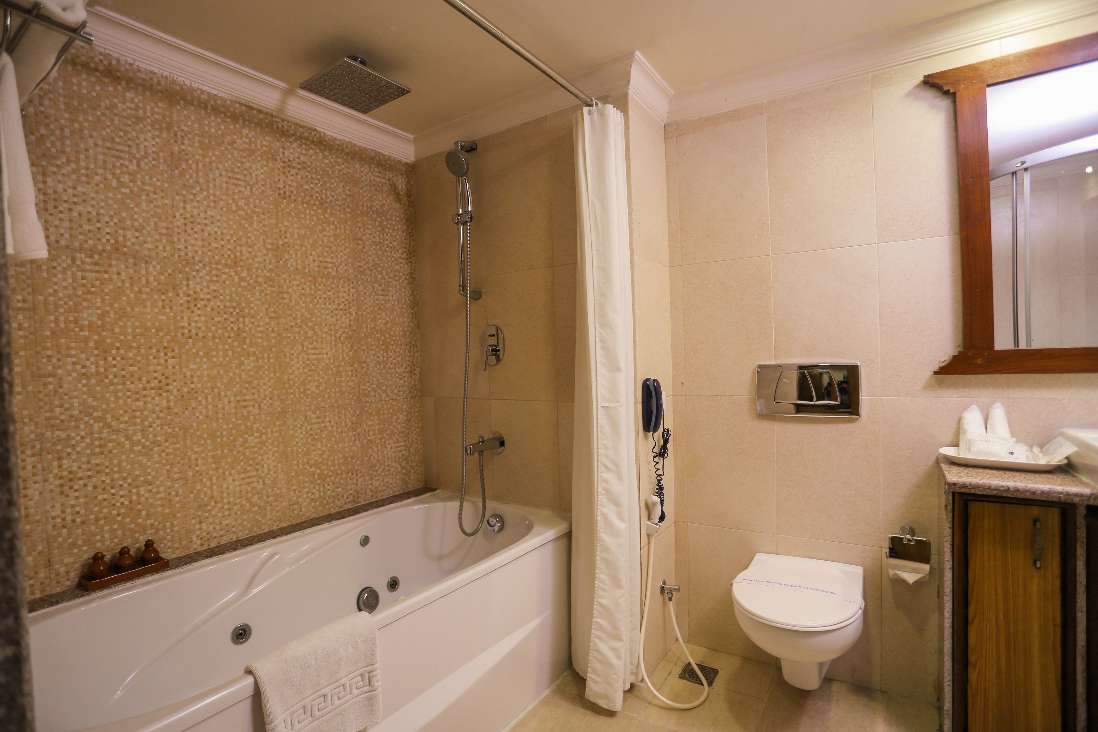 suite | bathroom | rainfall showerhead, free toiletries, hair dryer, slippers