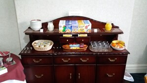 A buffet setup with various food items and beverages. - Waverley Bed & Breakfast (Minehead)