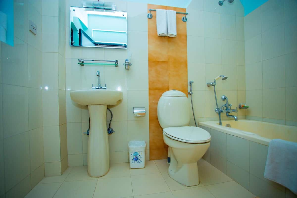 rainfall showerhead, free toiletries, slippers, bidet