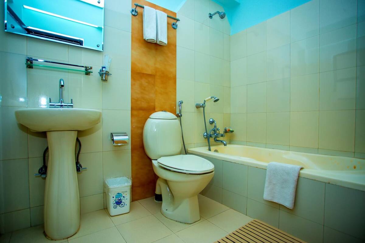 rainfall showerhead, free toiletries, slippers, bidet