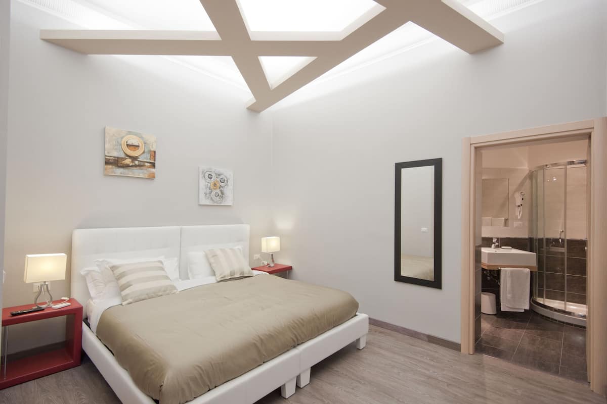 Lenzuola Frette, copriletto in piuma
