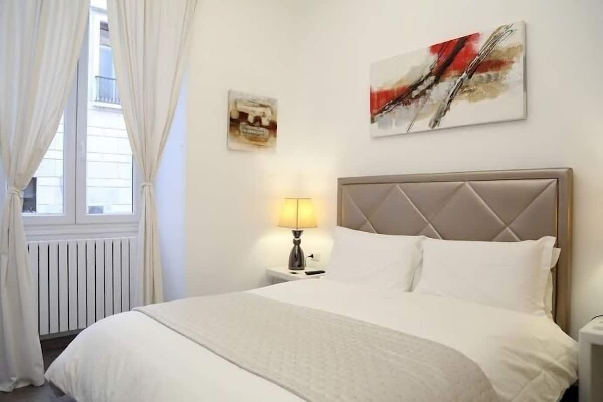 Doppia Deluxe, 1 letto matrimoniale, vista città | Lenzuola Frette, copriletto in piuma