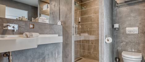 Shower, free toiletries, hair dryer, towels
