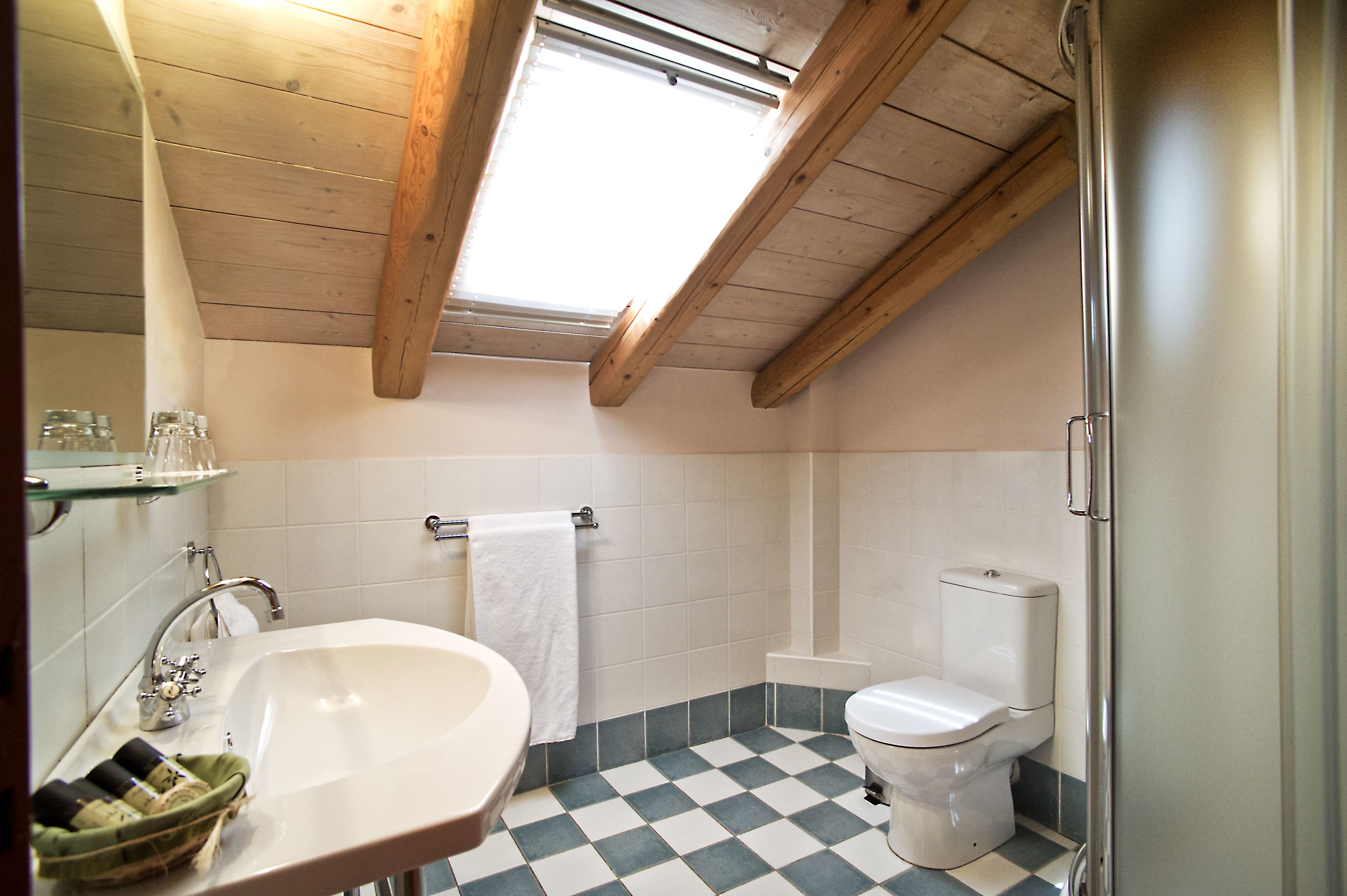 junior suite, 1 queen bed | bathroom | shower, rainfall showerhead, designer toiletries, hair dryer