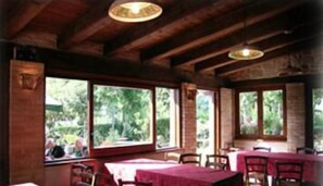 Breakfast, lunch, dinner served; local cuisine, garden views